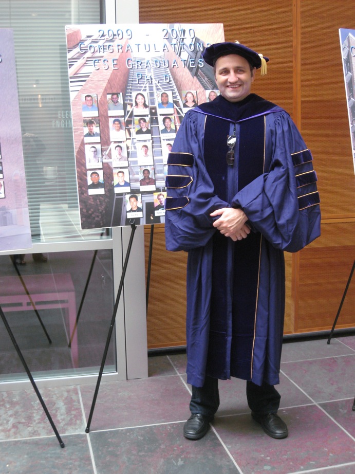 Andrei in doctoral attire